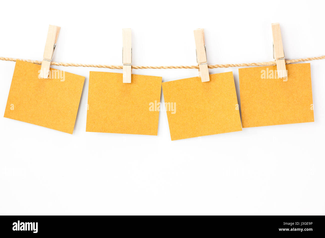 Post it note hanging on string hi-res stock photography and images