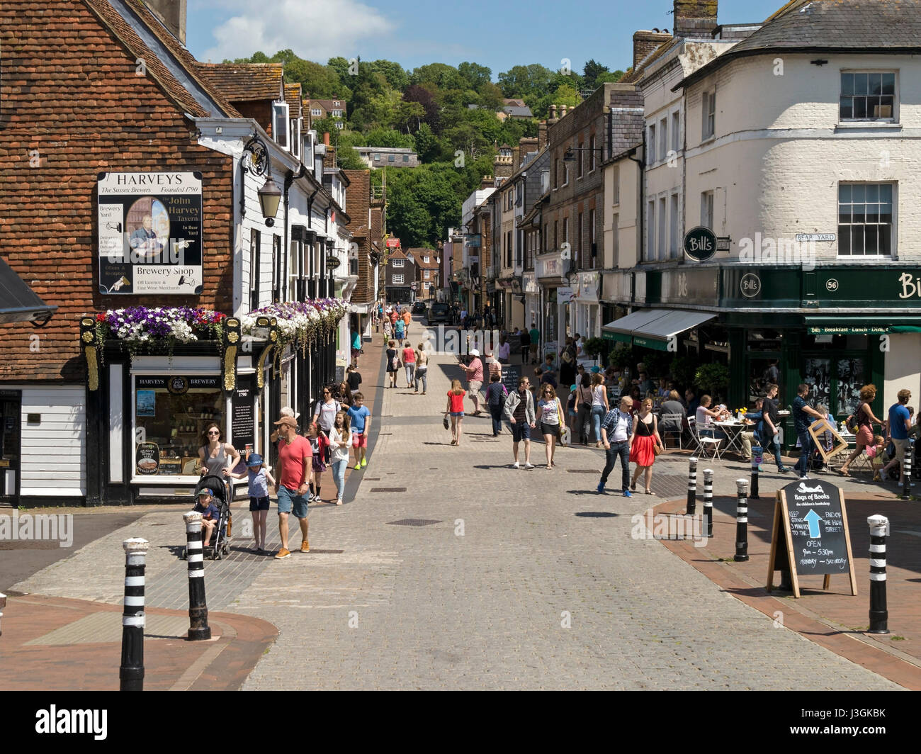 Busy Lewes pedestrianised Cliffe High Street with shops and shoppers on a sunny day in Summer, Lewes, East Sussex, England, UK Stock Photo