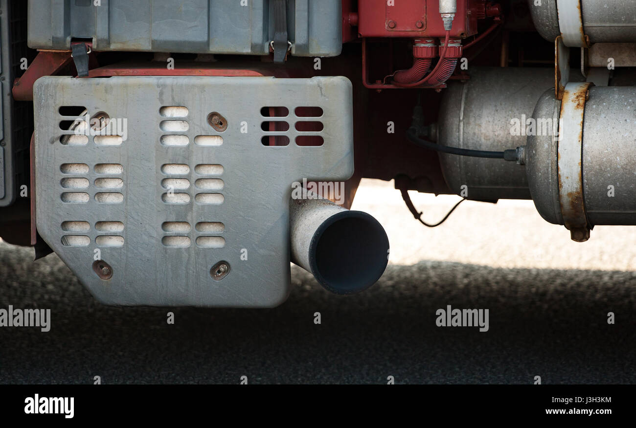 Exhaust gases emitted from sliencer of large truck Stock Photo