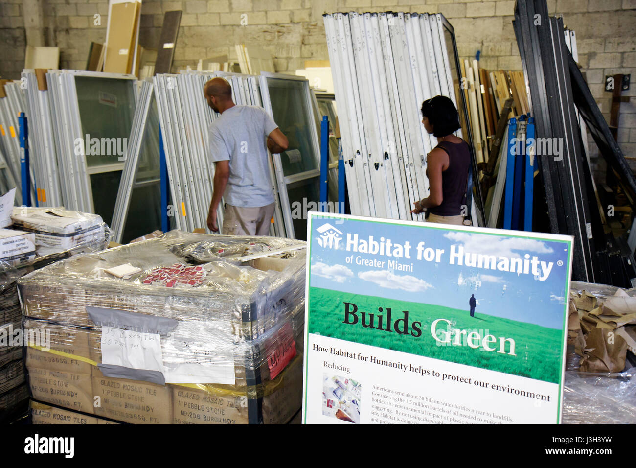 Miami Florida,Habitat for Humanity ReStore,sells donated building materials,tools,appliances,home furnishings,used,build,under new construction site b Stock Photo