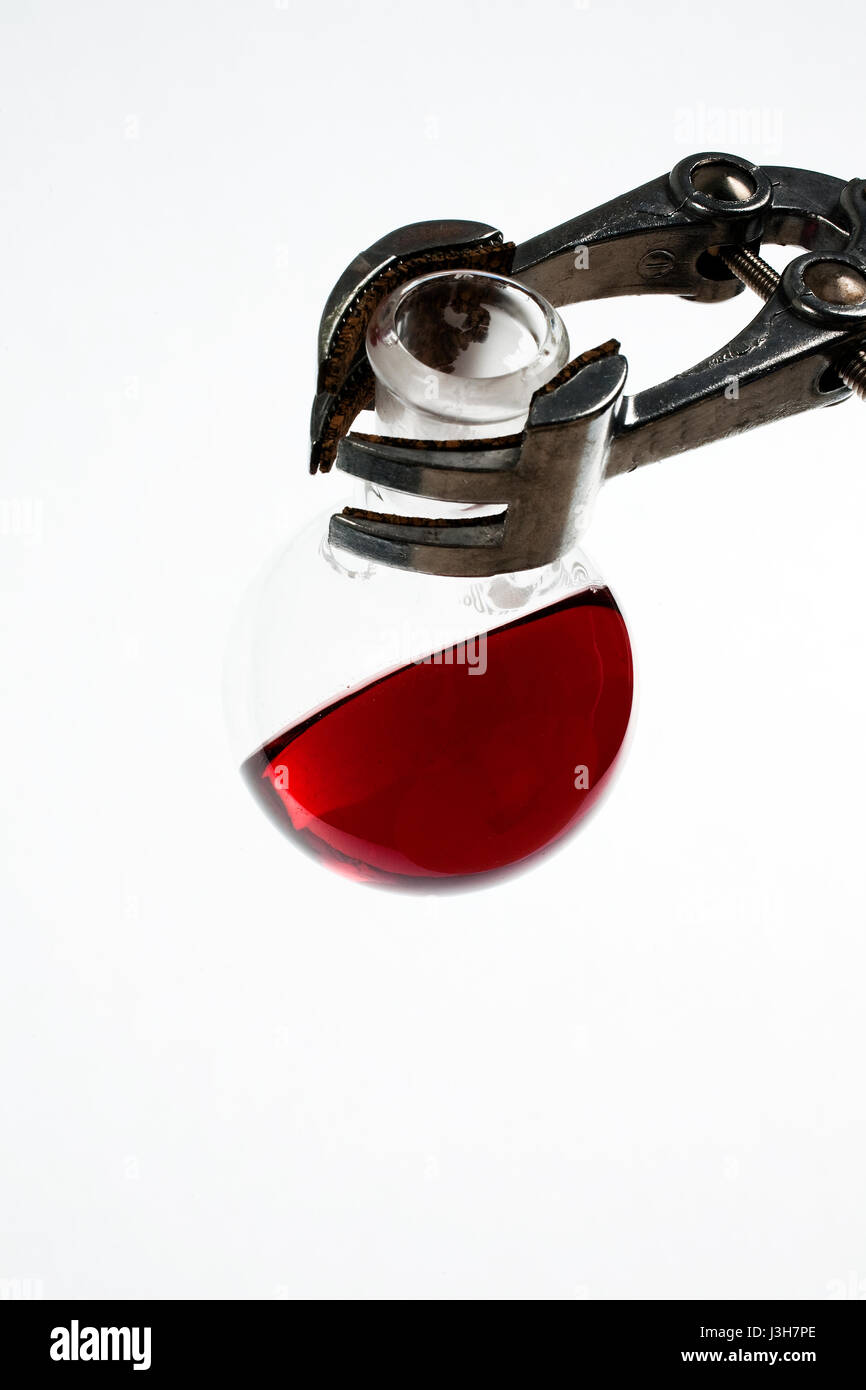 Chemistry glassware with colored liquid Stock Photo Alamy