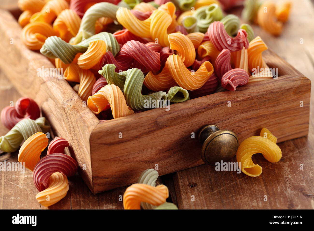 Colorful Italian pasta ‘Amore’ in small drawer Stock Photo Alamy