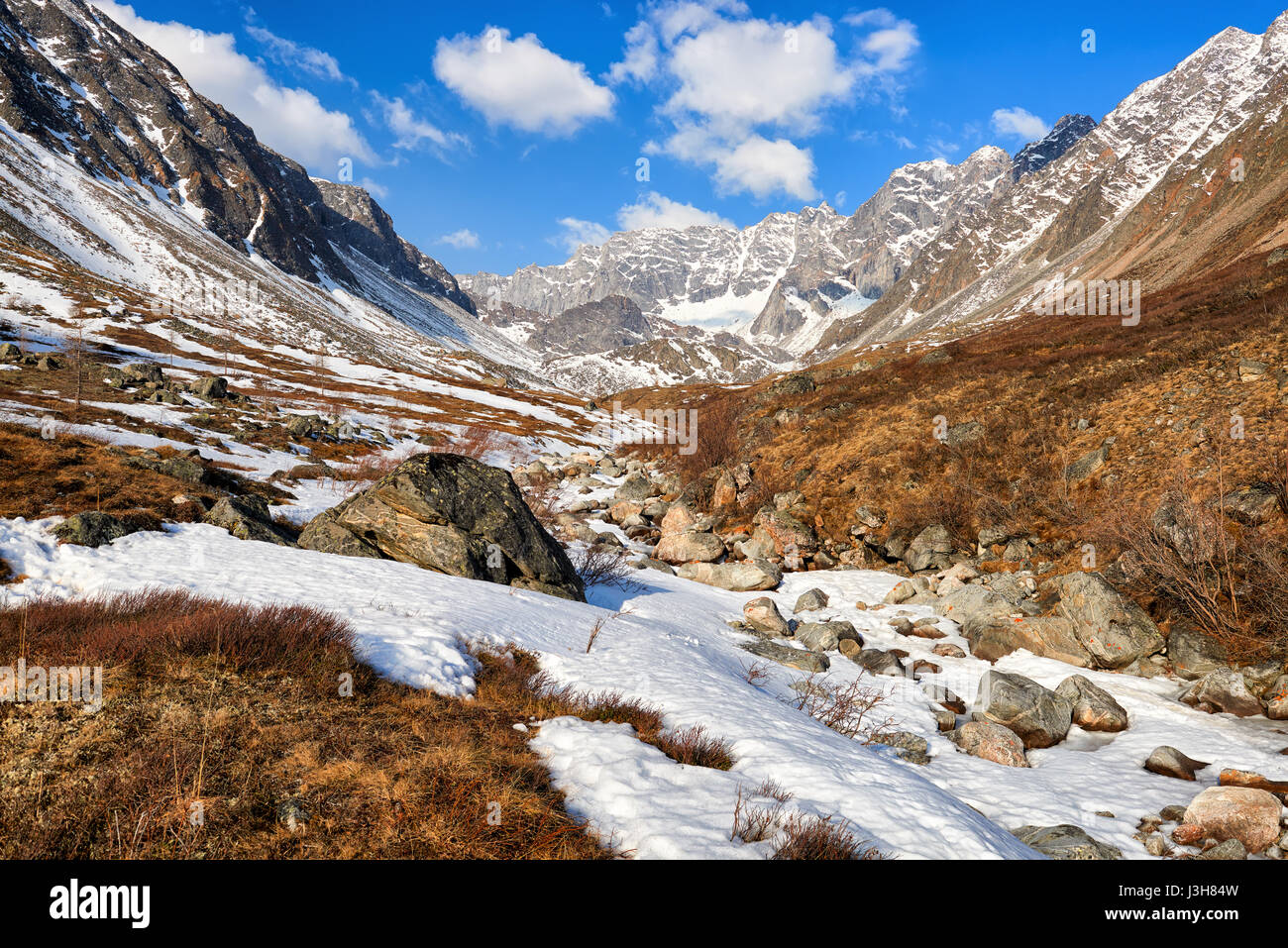 Valley of small brook in mountains of Eastern Siberia. Sayan Mountains. Russia Stock Photo