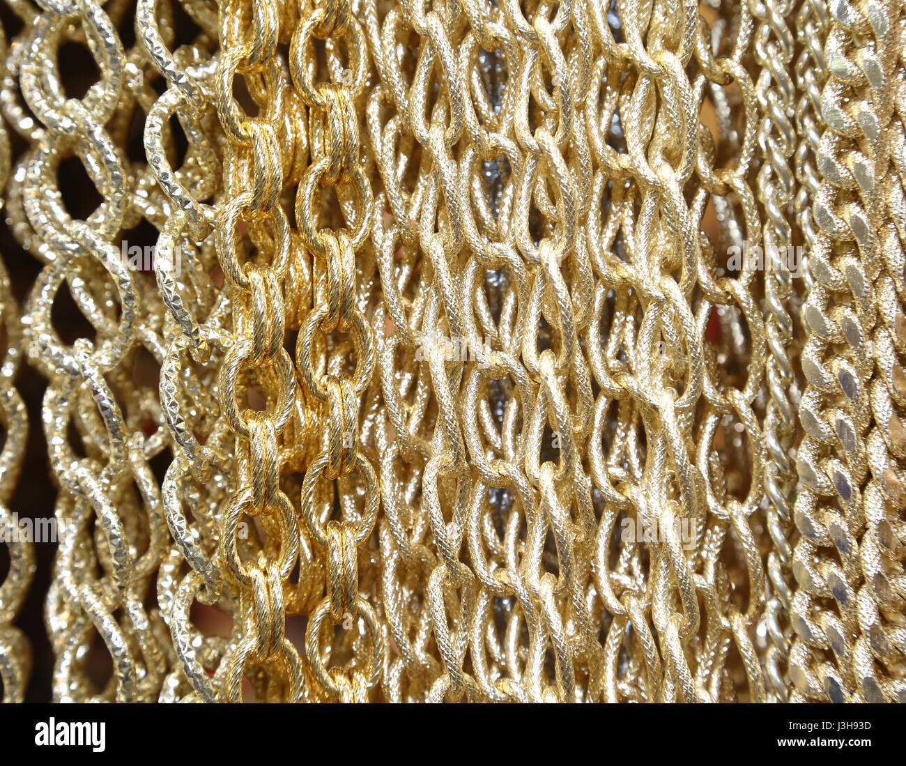 Golden chains necklace hi-res stock photography and images - Alamy
