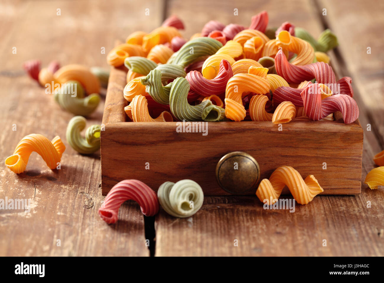 Colorful Italian pasta ‘Amore’ in small drawer Stock Photo Alamy