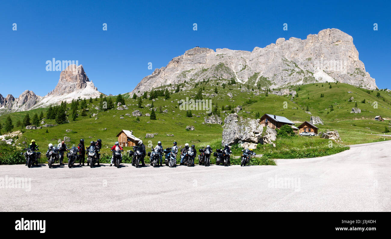 Dolomites, Italy - July 16, 2016: Motorcycles parked in the green mountain landscape Stock Photo