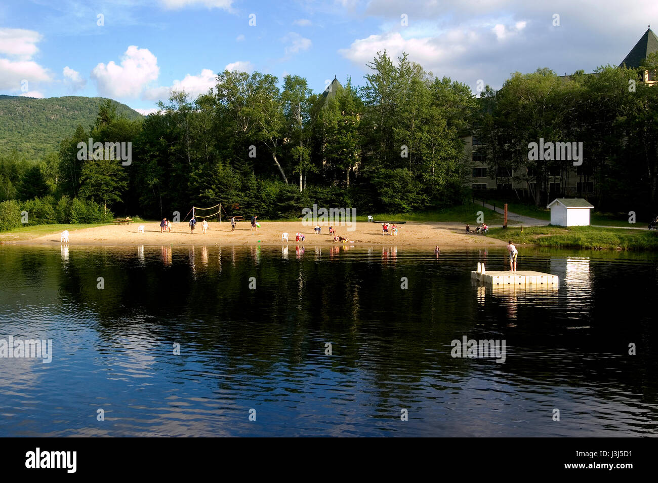 Early evening bathers at Waterville Valley, New Hampshire, USA Stock Photo