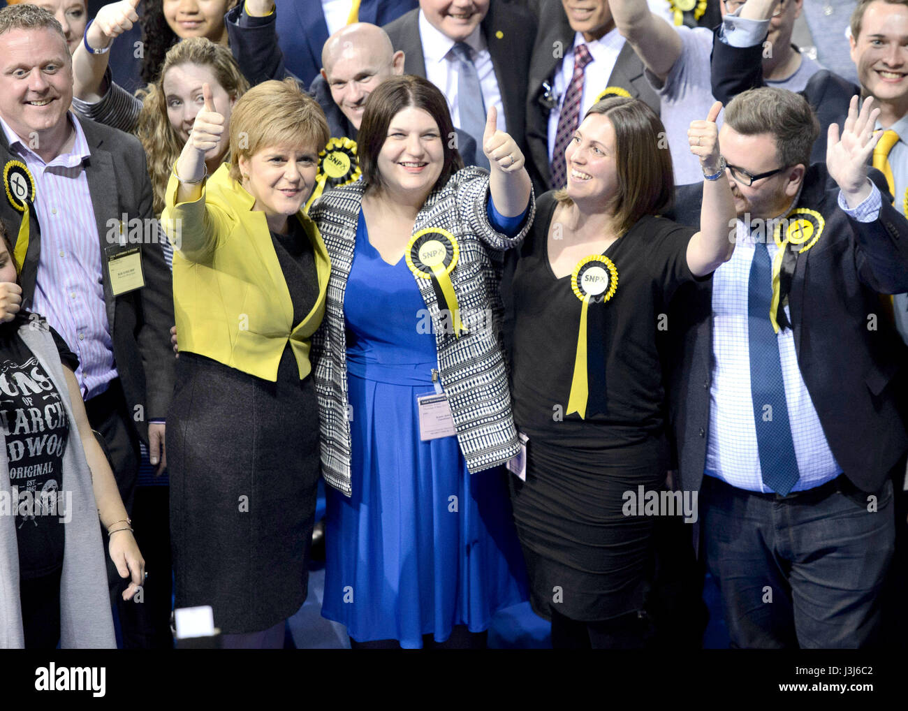 First Minister Nicola Sturgeon arrives with SNP Councillor Susan Aitken and meets supporters and councillors at the Emirates Stadium in Glasgow as election staff count ballot papers for the local elections. Stock Photo
