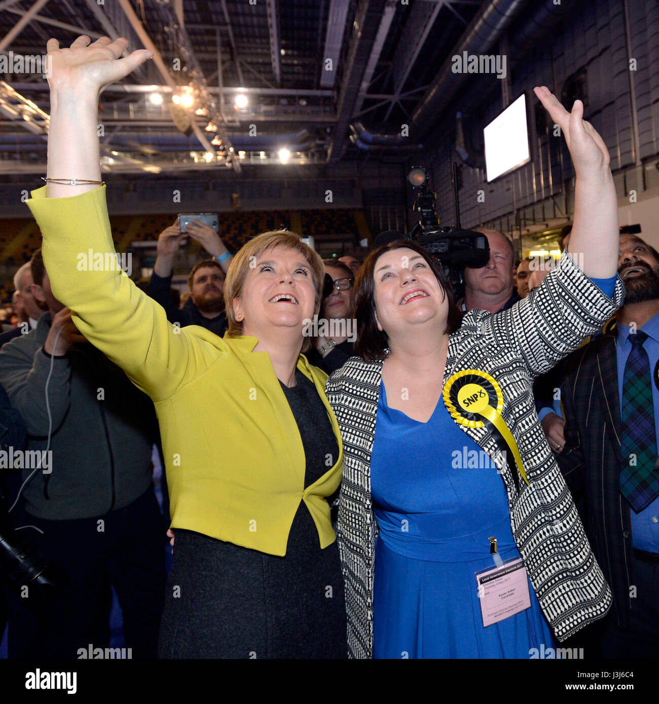 First Minister Nicola Sturgeon arrives with SNP Councillor Susan Aitken at the Emirates Stadium in Glasgow as election staff count ballot papers for the local elections. Stock Photo