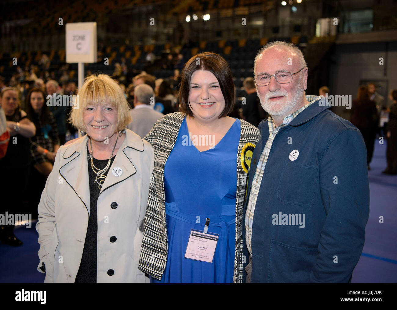 SNP's Susan Aitken SNP with her mother Doris and father George at the Emirates Stadium in Glasgow as election staff count ballot papers for the local elections. Stock Photo
