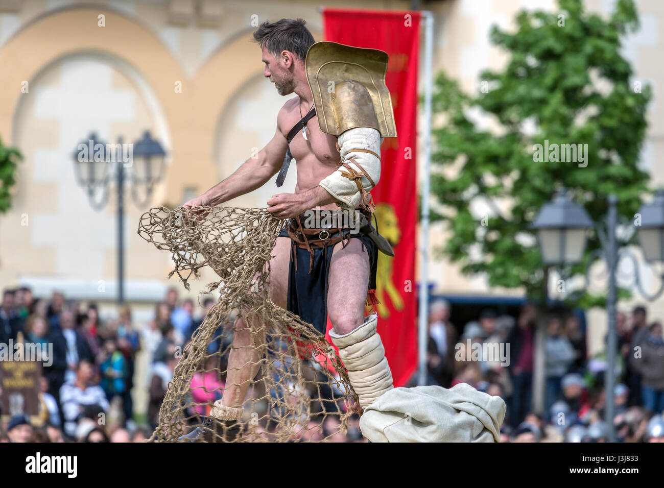 ALBA IULIA, ROMANIA - APRIL 30, 2017: Roman gladiator make one fight demonstration at APULUM ROMAN FESTIVAL, organized by the City Hall. Stock Photo