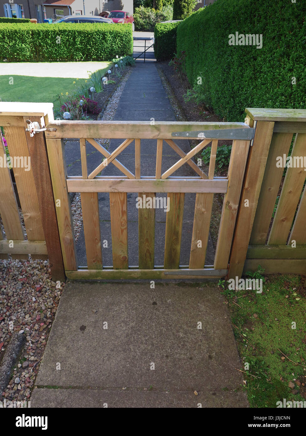 Wooden garden gate and path Stock Photo
