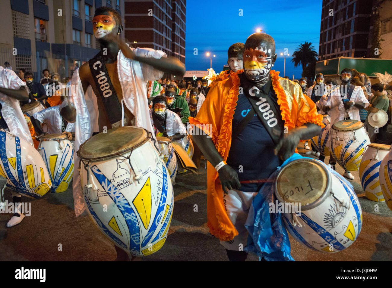 Traditional Murgas and samba schools during the Llamadas (the calling) procession that officially starts the carnival in Montevideo, Uruguay. Is the l Stock Photo