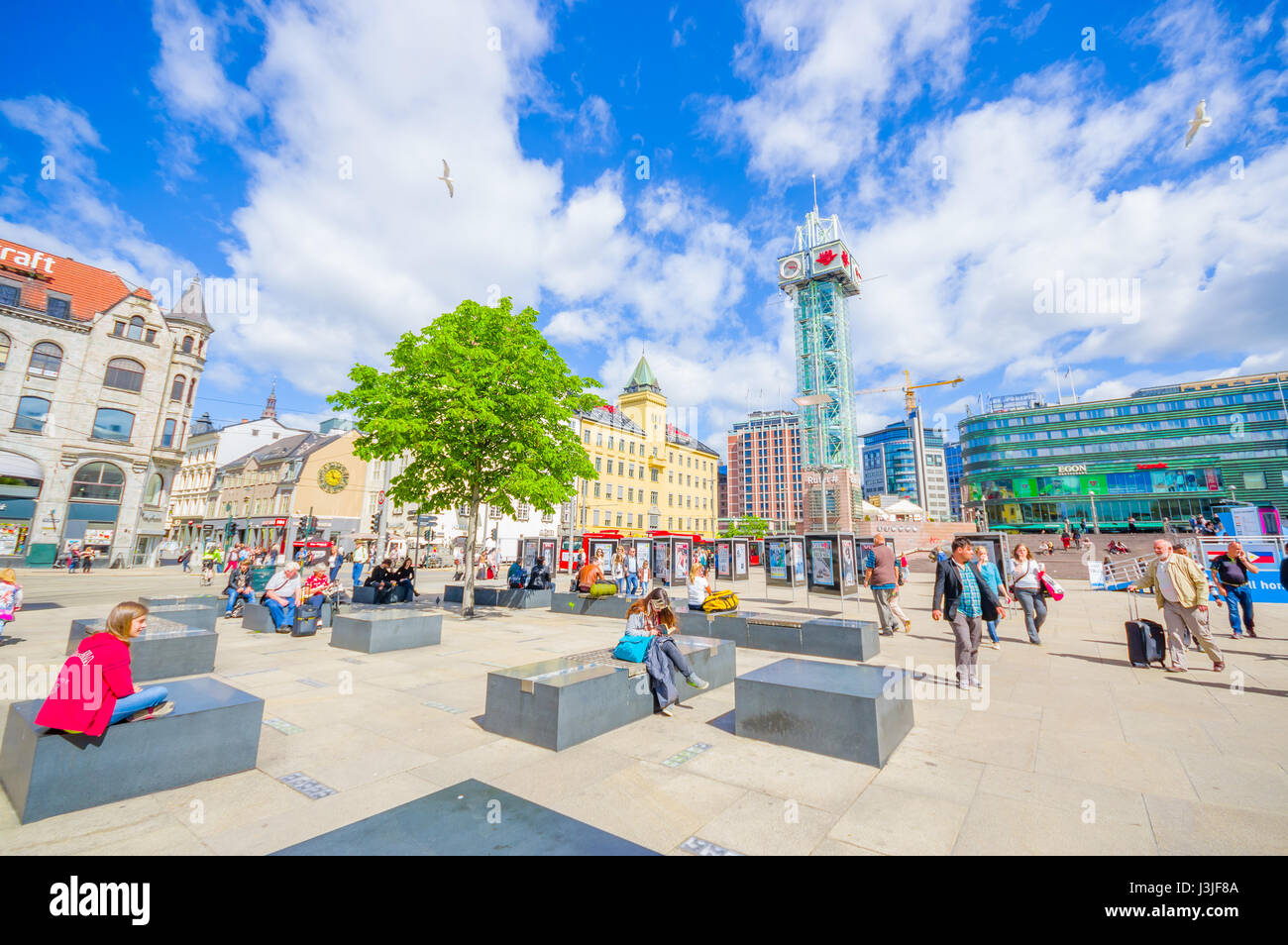 OSLO, NORWAY - 8 JULY, 2015: Plaza in front of Oslo Central station with people around on nice sunny day. Stock Photo