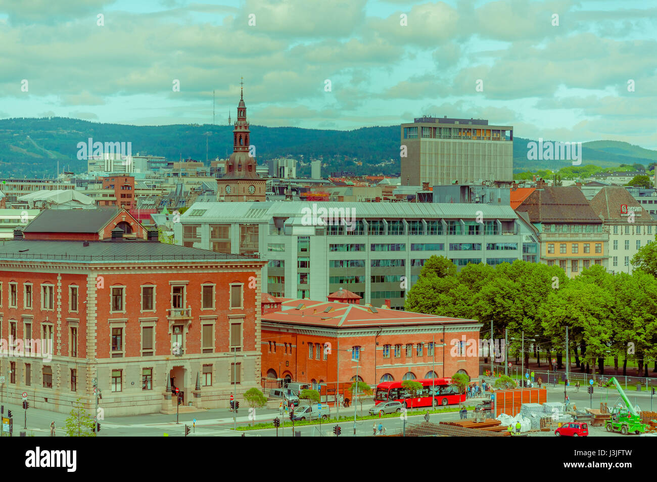 OSLO, NORWAY - 8 JULY, 2015: Great view from roof of opera building showing city rooftops and green hillsides in distance. Stock Photo