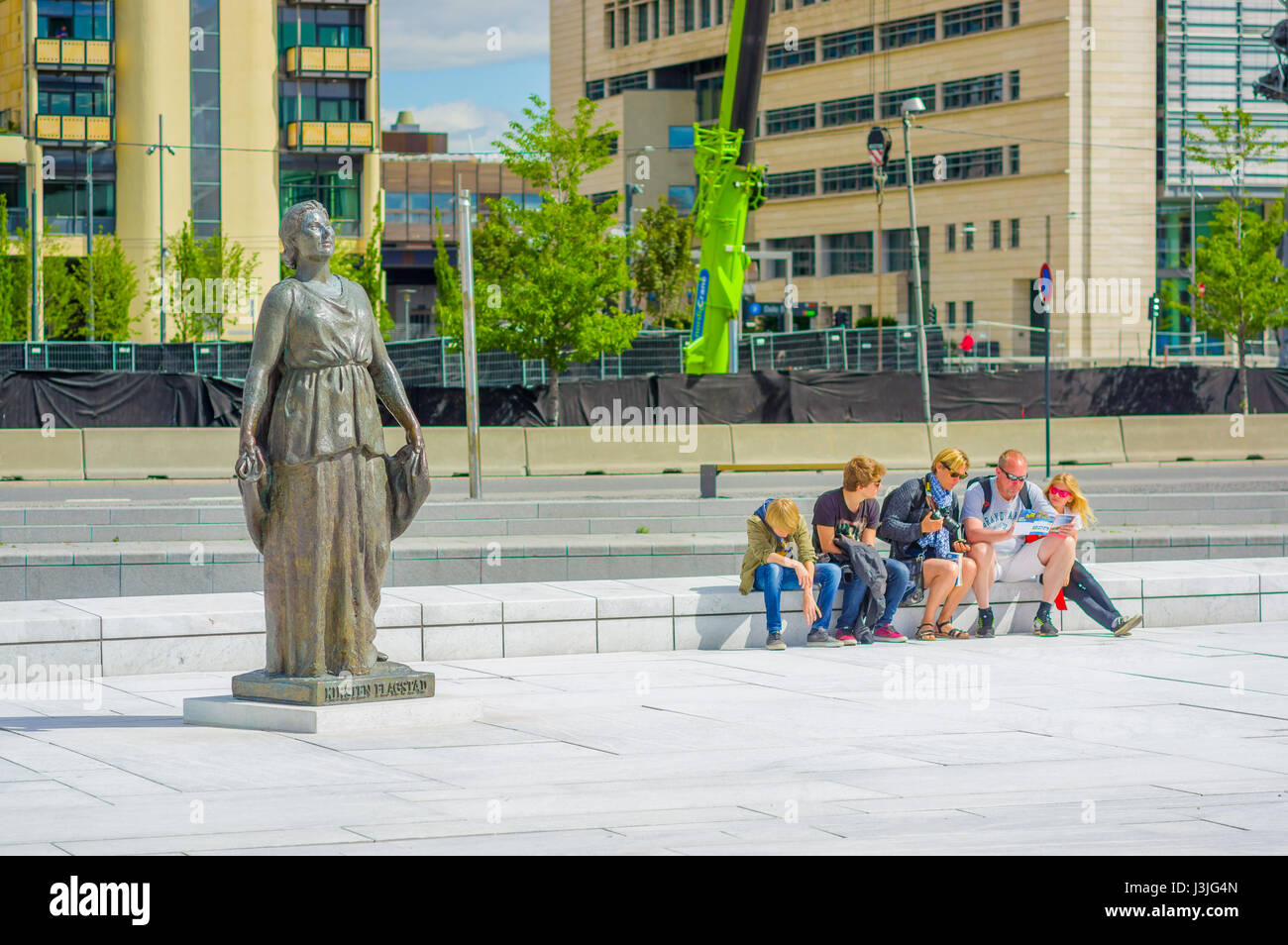 OSLO, NORWAY - 8 JULY, 2015: Beautiful statue showing Kirsten Flagstad located in front of landmark opera house. Stock Photo