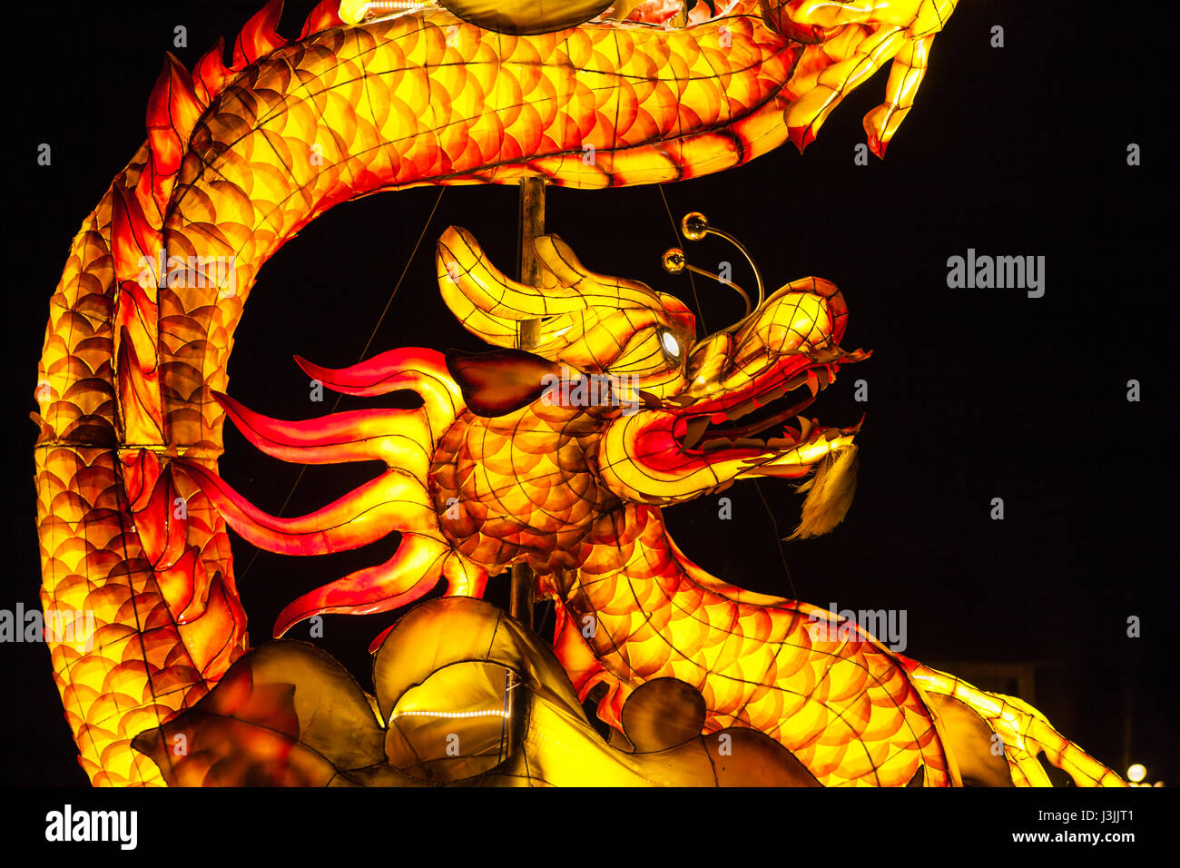 Hoi An, Full Moon Festival, figure of yellow dragon Stock Photo