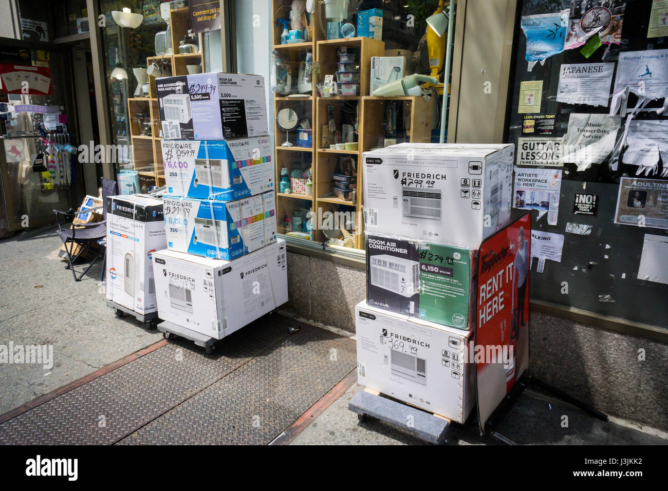 A selection Frigidiaire and Friedrich air conditioners outside of a hardware store in New York n Saturday, April 29, 2017 reminds New Yorkers of the imminent arrival of summer. (© Richard B. Levine) Stock Photo