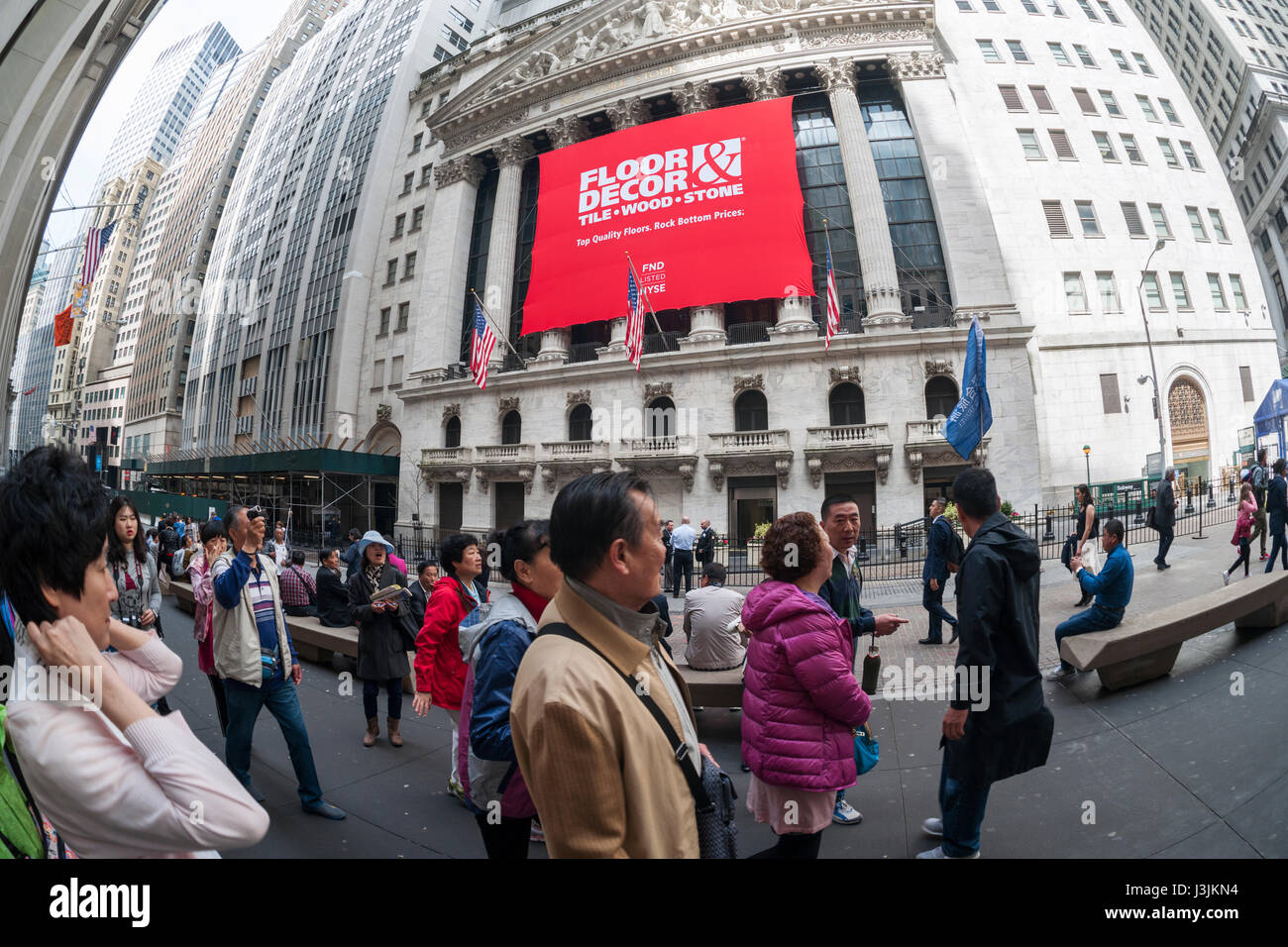 Hordes of tourists descend on the New York Stock Exchange, decorated for the first day of trading for Floor & Decor Holding's initial public offering on Thursday, April 27, 2017. Floor &