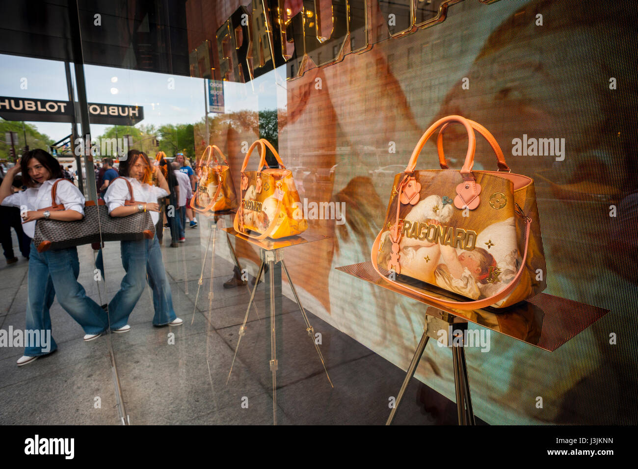 Jeff Koons limited edition handbags are seen in the window of Louis Vuitton  on Fifth Avenue in New York on Saturday, April 29, 2017, The handbags, in  appropriated image style, feature portrayals