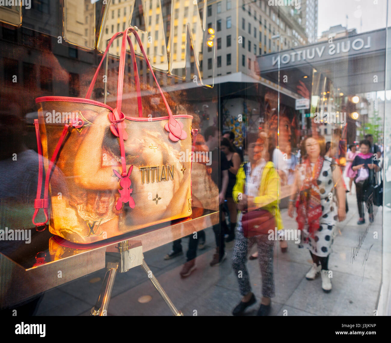 Jeff Koons limited edition handbags are seen in the window of Louis Vuitton  on Fifth Avenue in New York on Saturday, April 29, 2017, The handbags, in  appropriated image style, feature portrayals