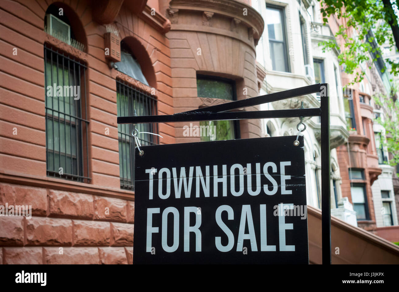 Sign for townhouse for sale in the Upper West Side nieghborhood of New York on Sunday, April 30, 2017. (© Richard B. Levine) Stock Photo