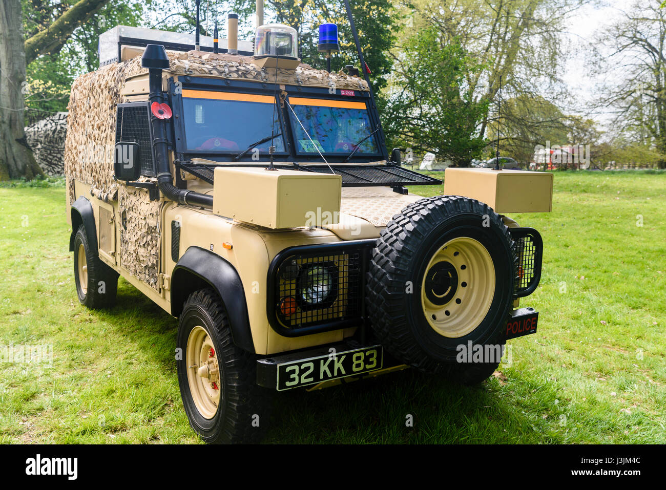 British army military police landrover with desert camouflage. Stock Photo