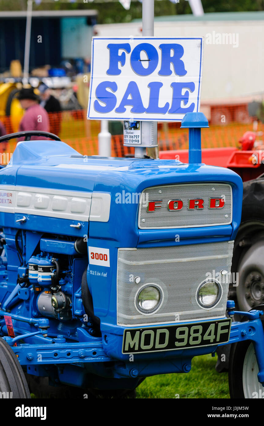 Classic Ford blue 1967 tractor with a For Sale sign Stock Photo Alamy