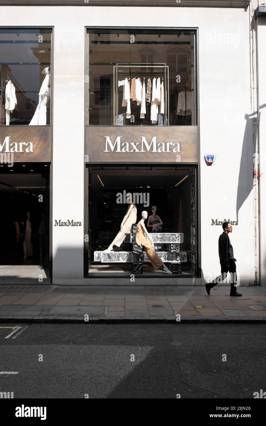 Exterior view of mannequins in the window of MaxMara Old Bond Street store in London W1   KATHY DEWITT Stock Photo