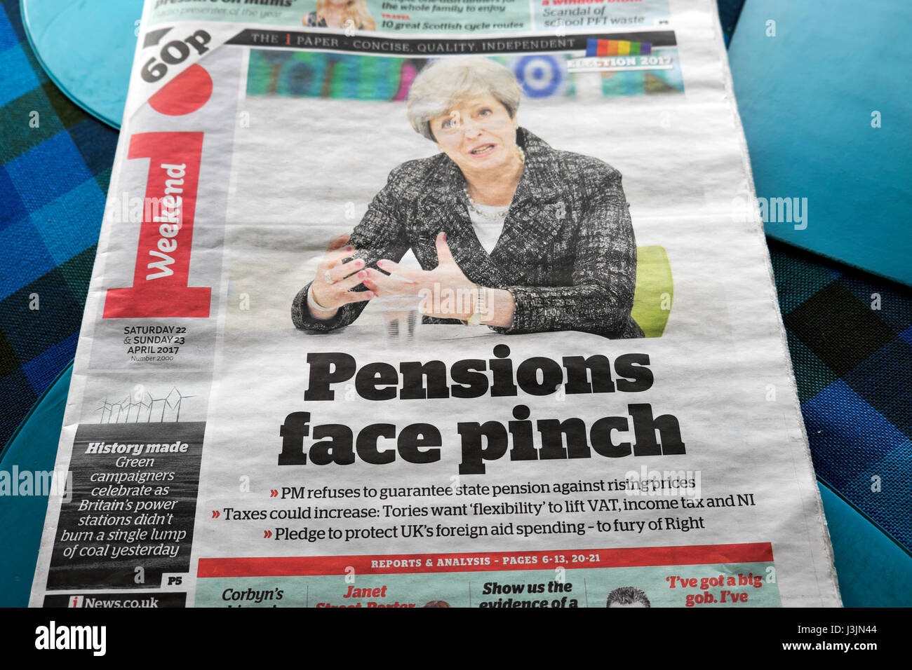 Prime Minister Theresa May on the front page of the i Weekend Independent newspaper headline 'Pensions face pinch' London UK Stock Photo