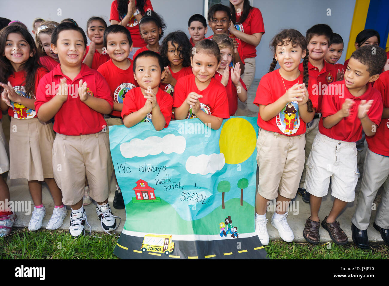 Miami Florida,Spanish Lake Elementary School,International Walk to School Day,student students pupil safety poster contest,parade,Hispanic boy boys,ma Stock Photo