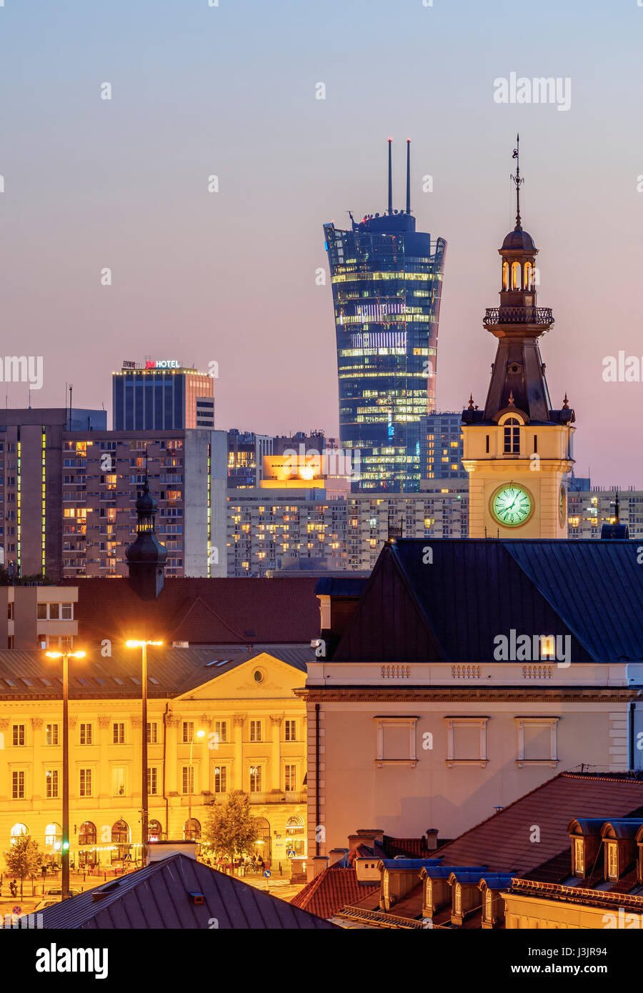 Poland, Masovian Voivodeship, Warsaw, View towards the clock tower of the Jablonowski Palace and Warsaw Spire skyscraper Stock Photo