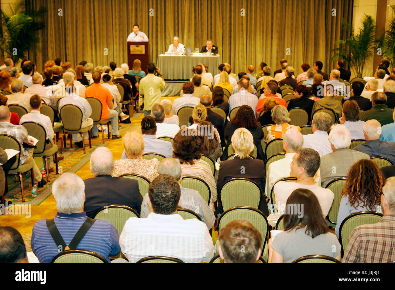 Audience crowd community speaker speaking stage podium hires stock photography and images Alamy