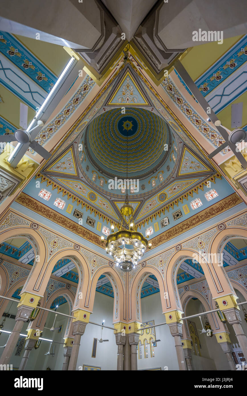 Beautiful interior decoration of Jumeirah Mosque Detail of ceiling, lamp and arches. The only mosque in Dubai which is open to the public Stock Photo