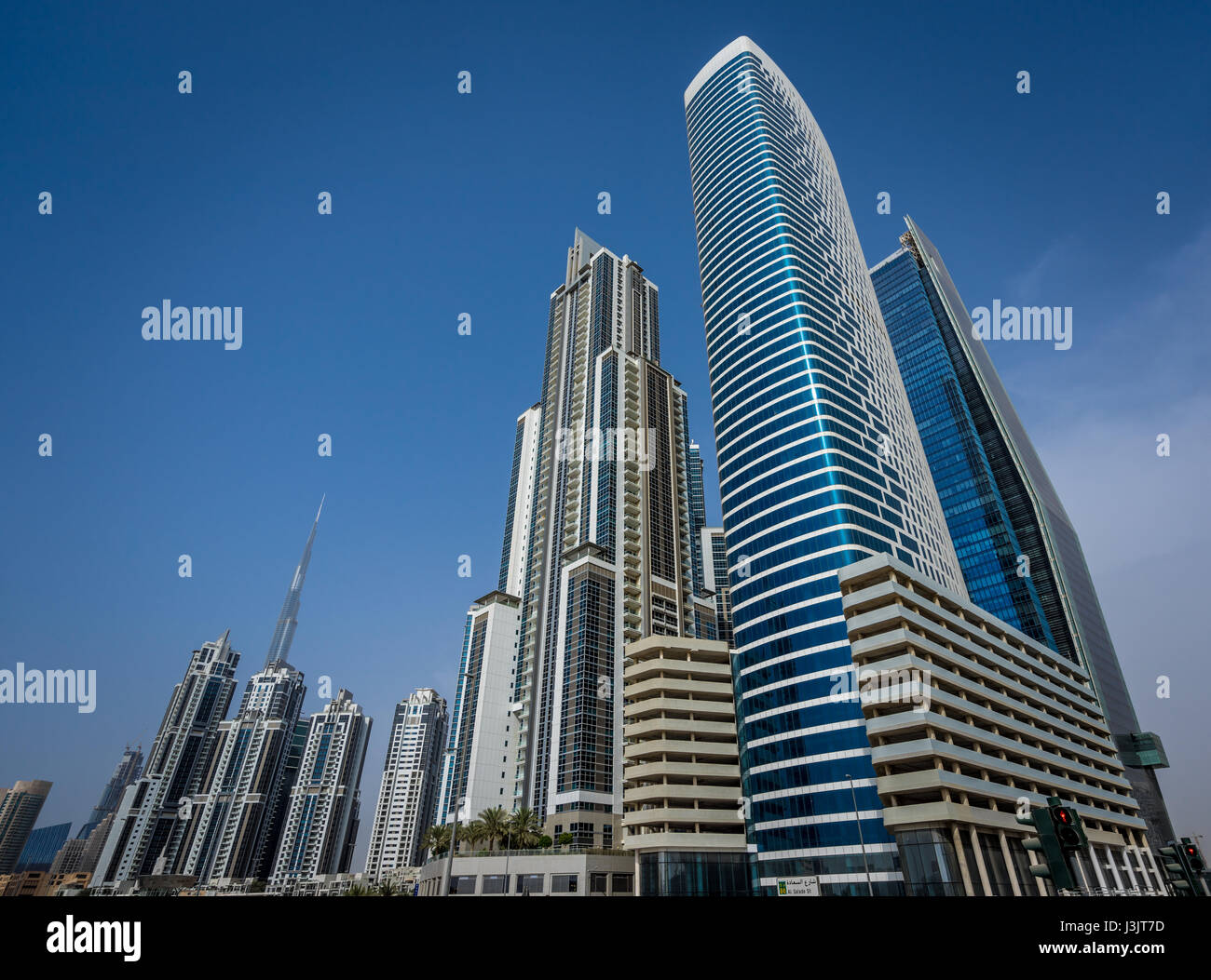 Street level view of The Bay Gate Tower, and Tower M - Executive Towers. Located in Al Saada street, Business Bay. Stock Photo