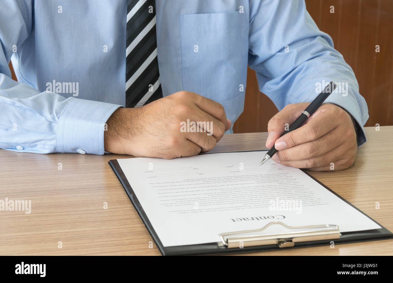 Businessman is signing a contract.  business concept Stock Photo