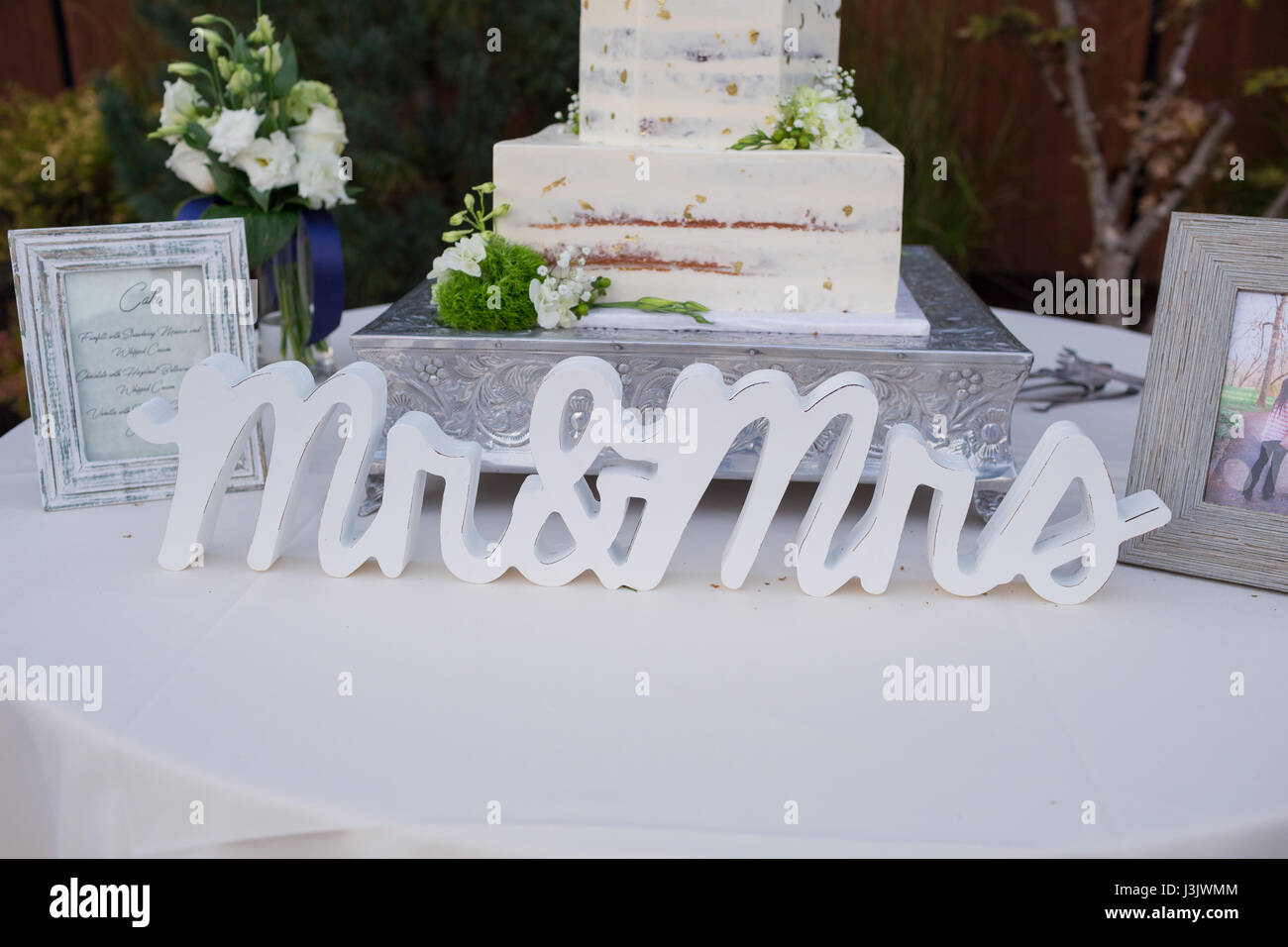 Wedding Cake with Gold Flakes Stock Photo Alamy