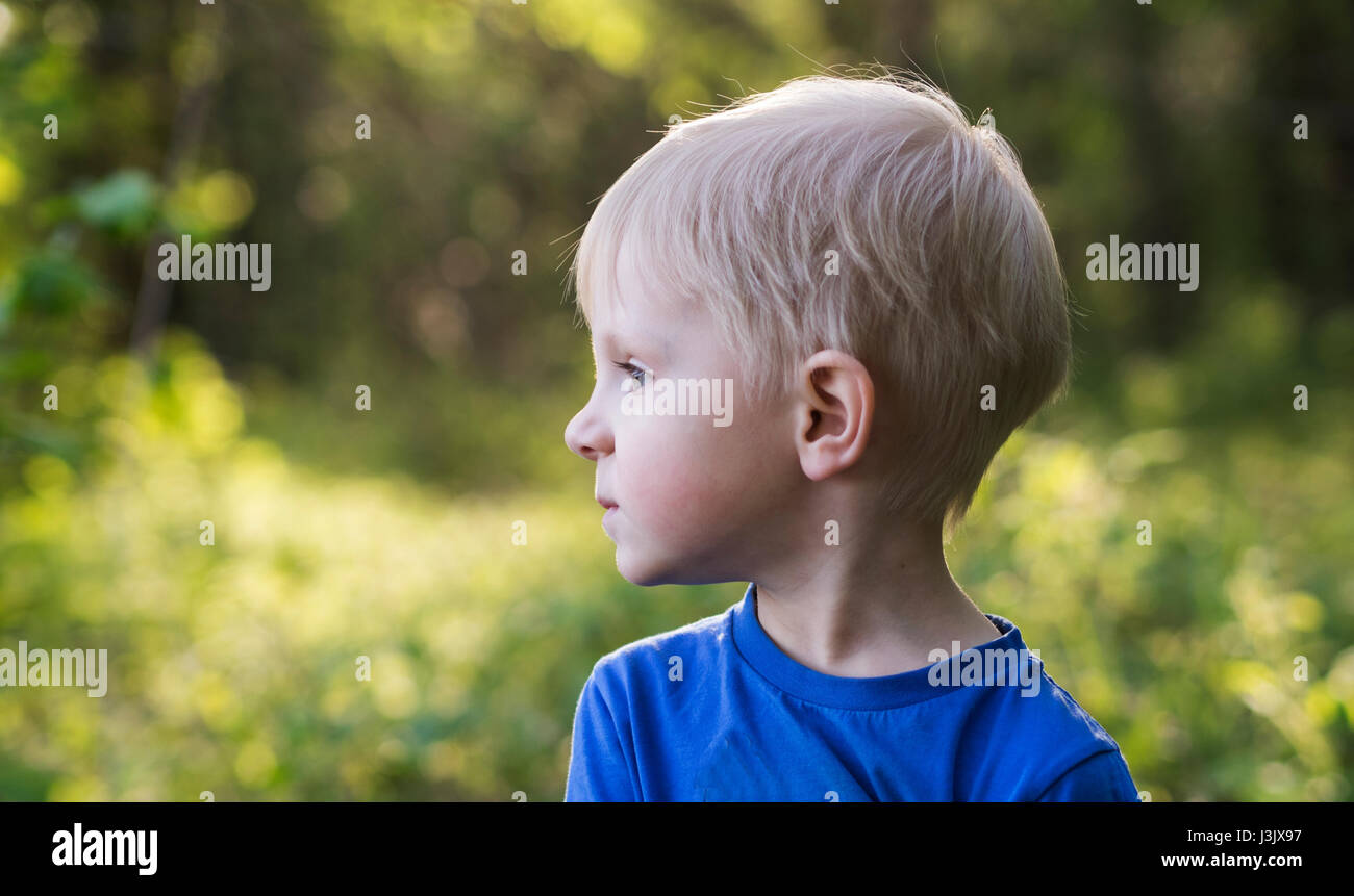 Portrait of a little boy outdoors Stock Photo - Alamy