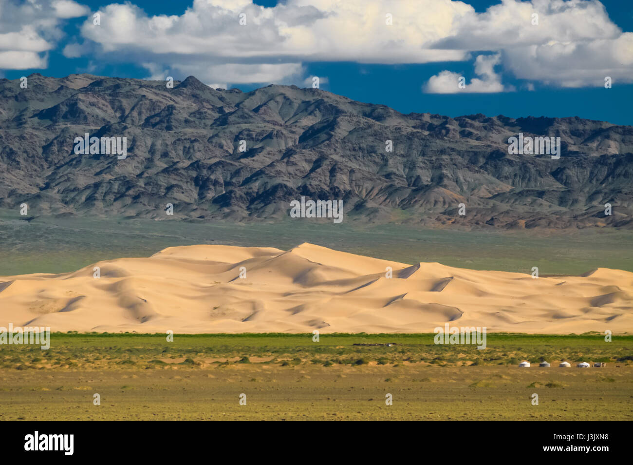 Altai Mountains with sand dunes and yurts Stock Photo