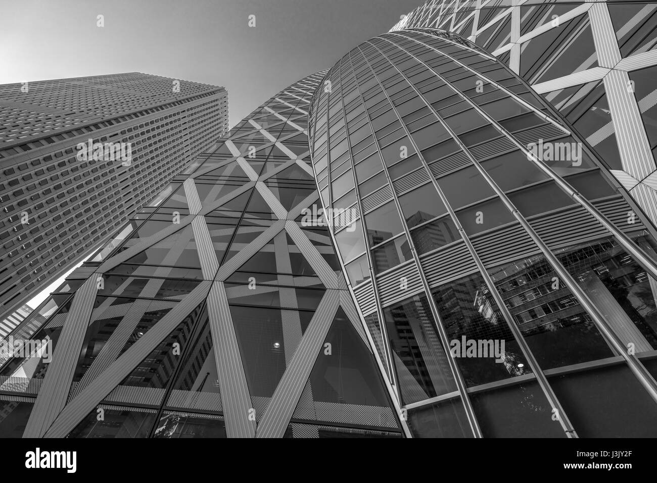 Street level view of Shinjuku Center Building and Tokyo Mode Gakuen Cocoon Tower, an educational facility building located in Nishi-Shinjuku district Stock Photo