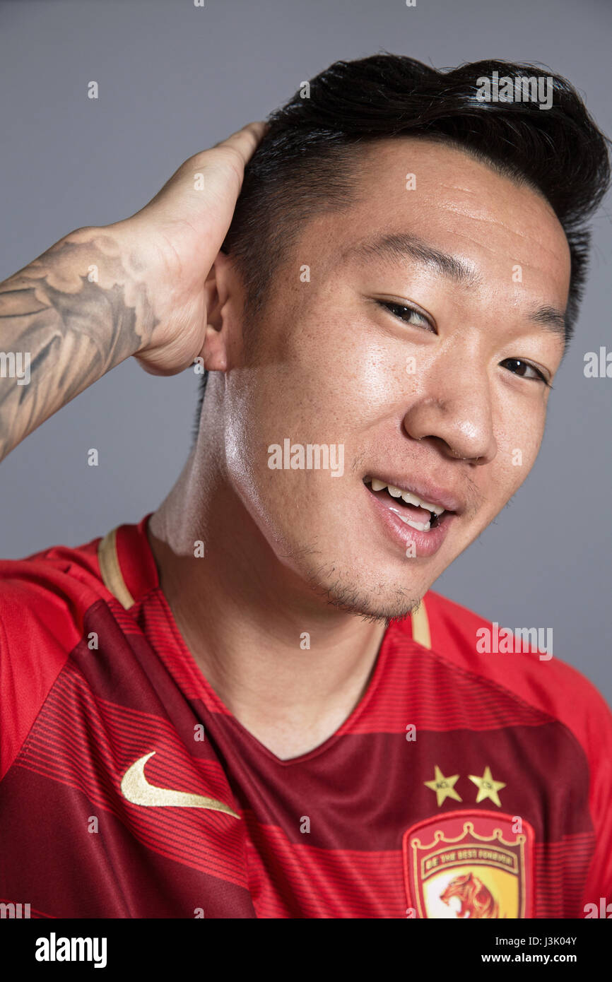 Portrait of Chinese soccer player Xu Xin of Guangzhou Evergrande Taobao F.C. for the 2017 Chinese Football Association Super League, in Guangzhou city, south China's Guangdong province, 18 February 2017. Stock Photo