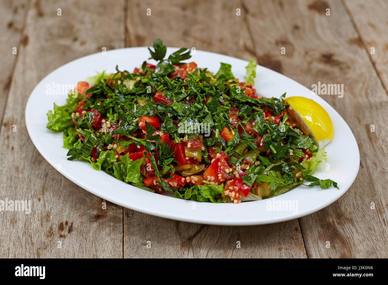 Oriental,anatolian salad with chopped tomatoes,persley and groats Stock