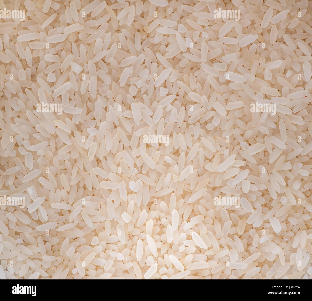 Uncooked Rice Texture Uncooked organic brown rice texture Stock Photo - Alamy