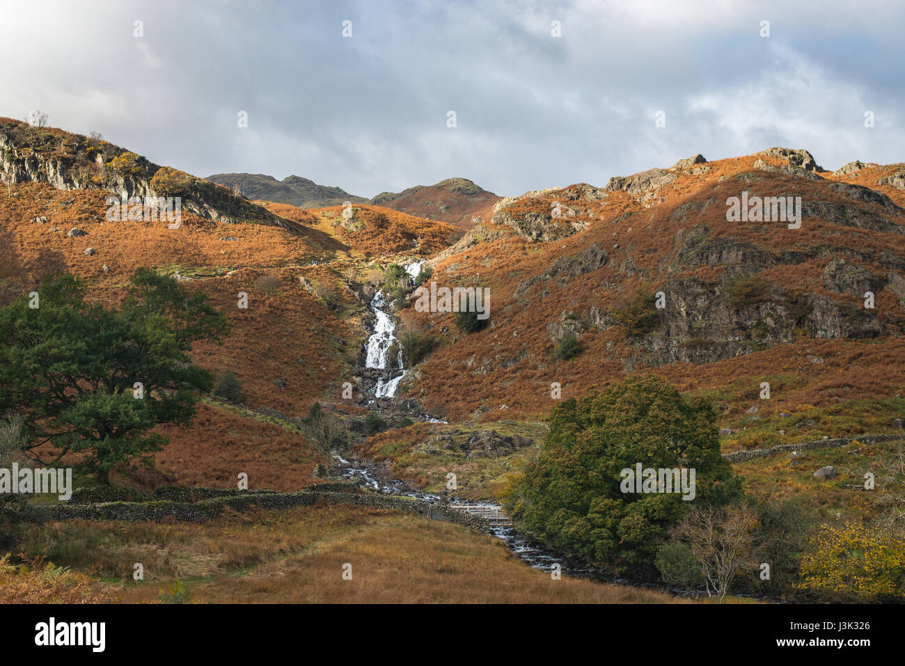looking over one of the many waterfalls around the lake district from