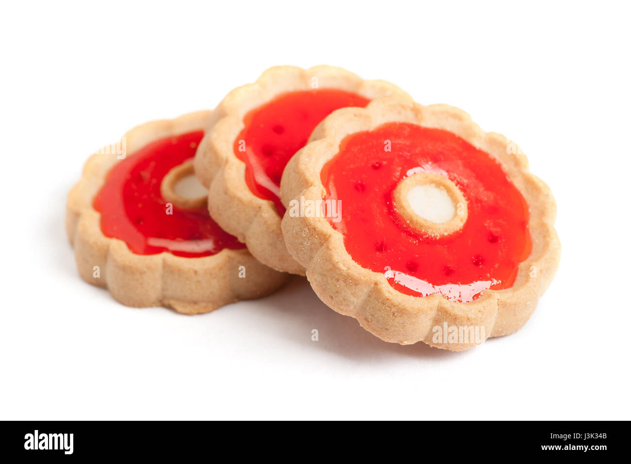 Cookies with red jam isolated on white Stock Photo Alamy