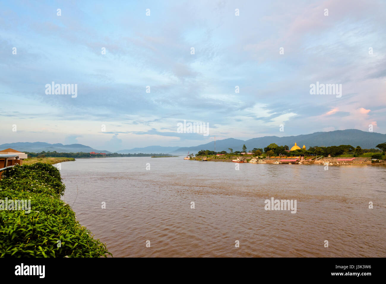 Natural landscape of Mekong River is a muddy color during sunset at Golden Triangle Park (Sob Ruak) is the border between Thailand, Laos and Myanmar i Stock Photo