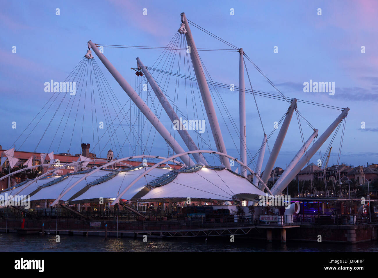 Molo Ponte Embriaco on Piazza delle Feste and the Bigo designed by Italian architect Renzo Piano in the Old Harbour in Genoa, Liguria, Italy, at sunset. Stock Photo