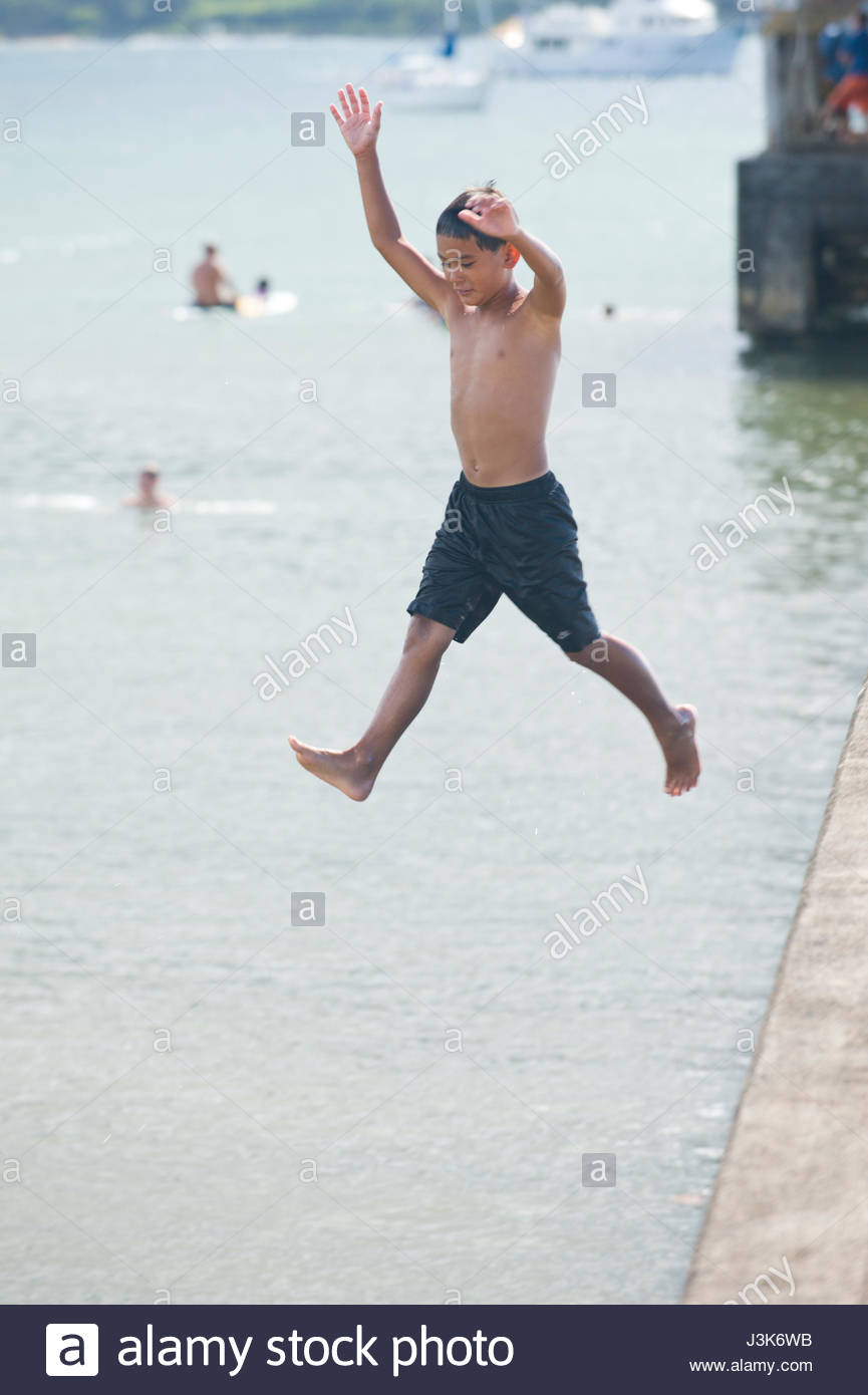 Boy Jumping Off Pier High Resolution Stock Photography and Images Alamy