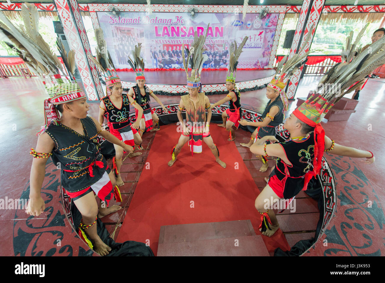 A group of young Kadazan-Dusun ethnic with traditional attire perform during the GATA Festival in Sipitang, Sabah, Malaysia. Stock Photo