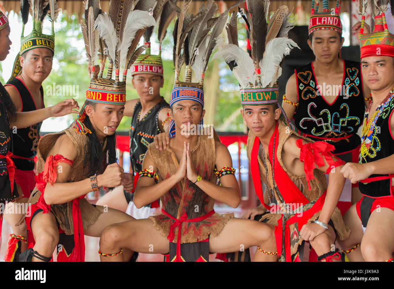 A group of young Kadazan-Dusun ethnic with traditional attire perform during the GATA Festival in Sipitang, Sabah, Malaysia. Stock Photo